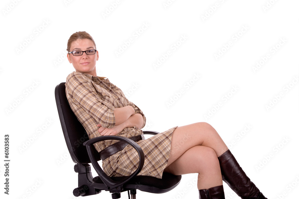 Businesswoman sit on office chair.