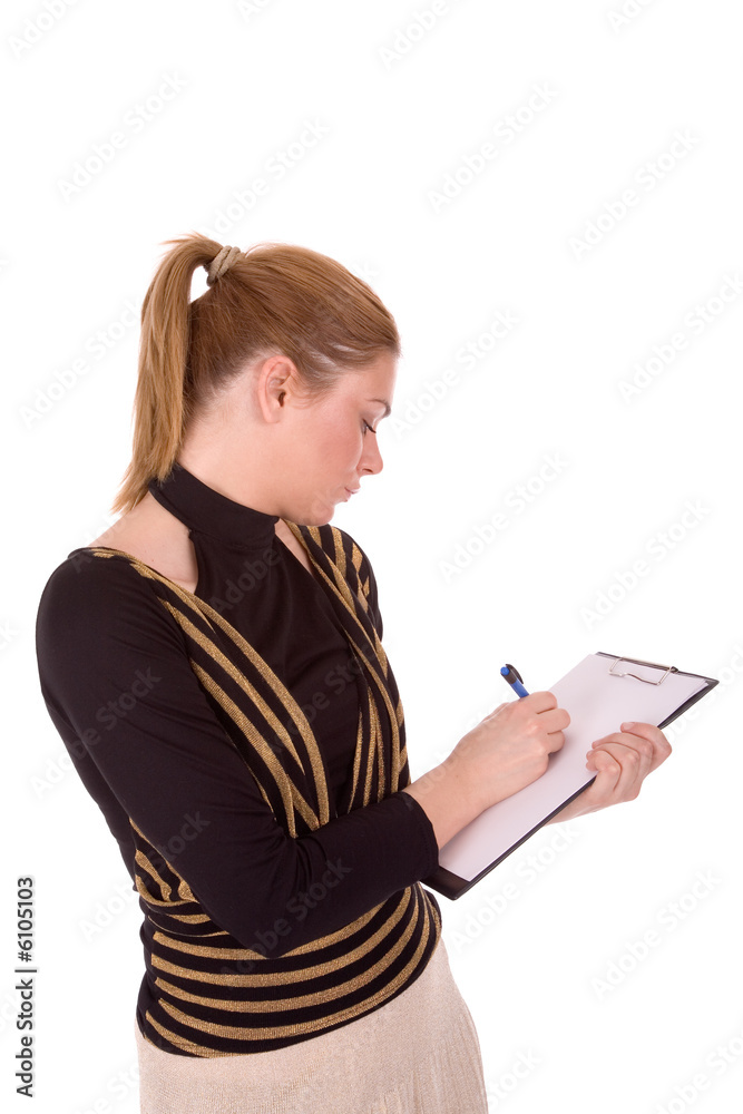 Businesswoman writes on document. Businesswoman writes on document.