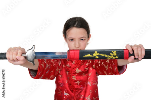 Kung fu girl takes out sword