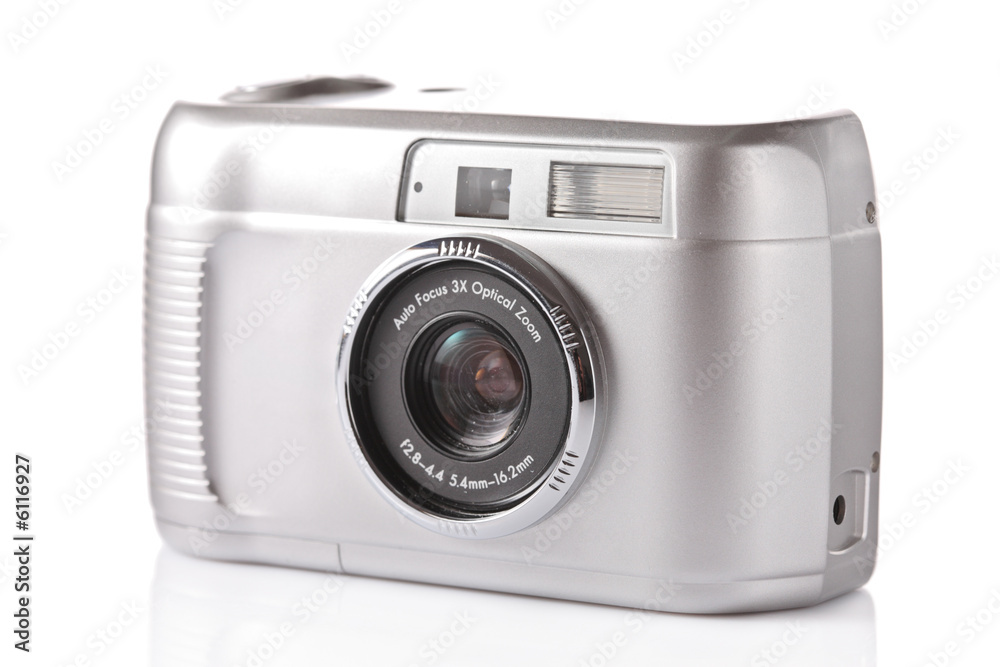 Digital camera against white background Digital camera against white background