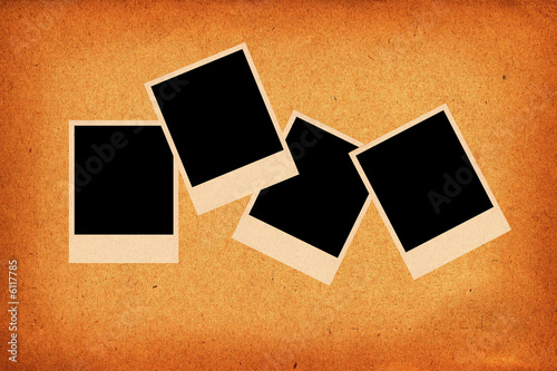 brown old textured scrap paper with polaroid photos