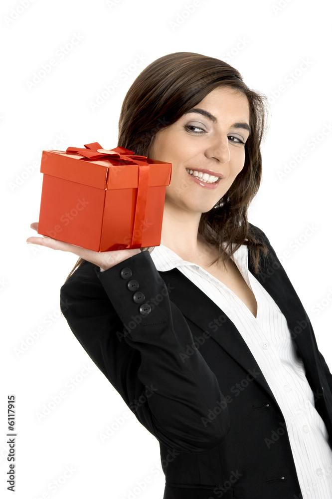 Beautiful bussiness woman holding a gift isolated on white Beautiful bussiness woman holding a gift isolated on white
