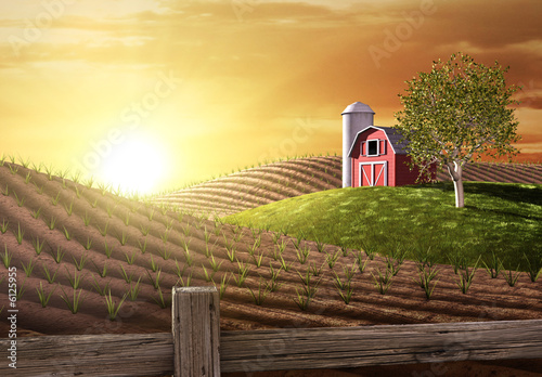 Red barn and tractor on a farm