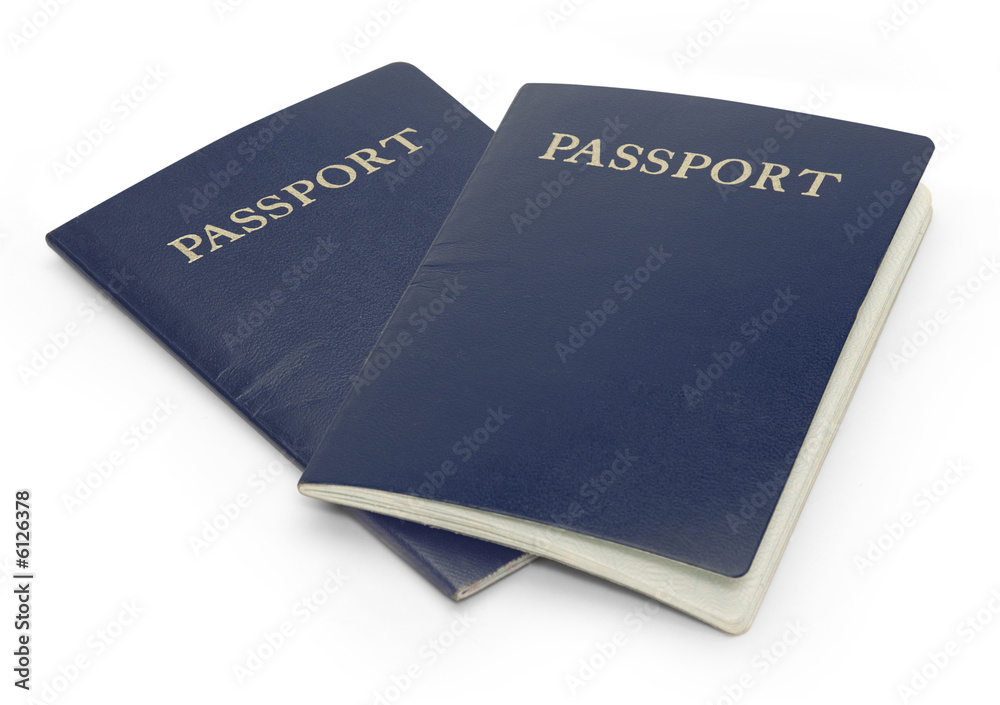 Two passports isolated on a white background with clipping path Two passports isolated on a white background with clipping path
