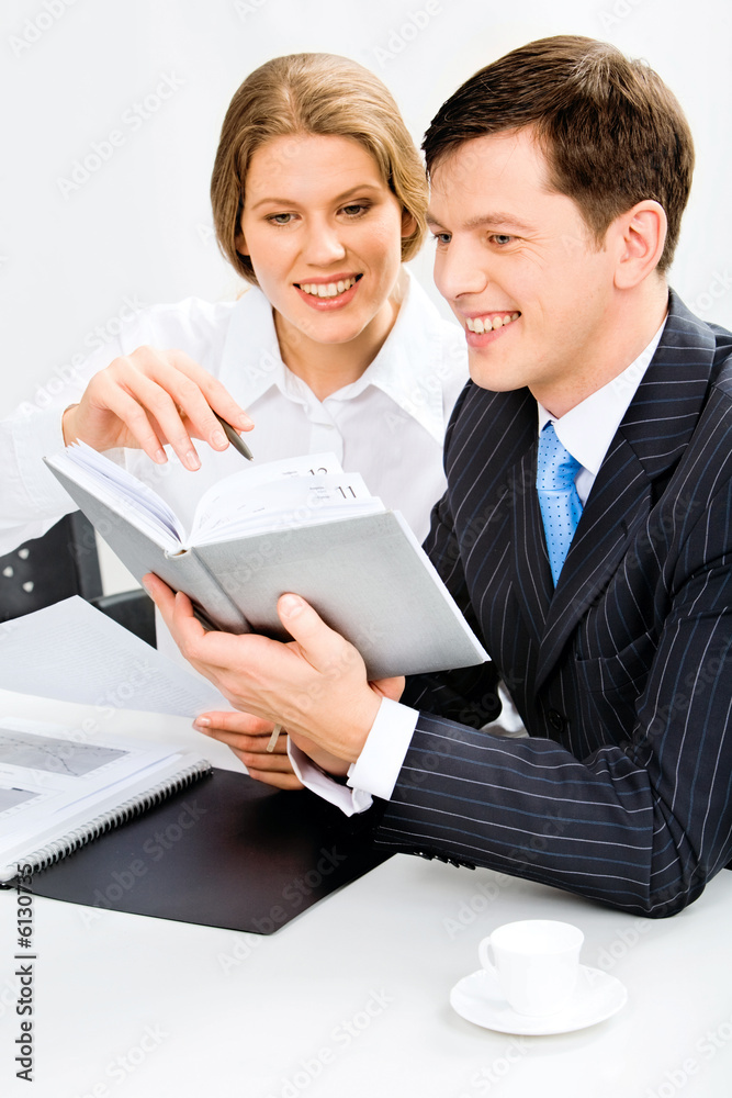 Portrait of business people planning their schedule of works Portrait of business people planning their schedule of works