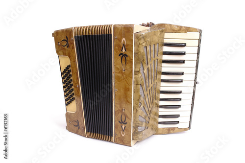 Studio shot of retro accordion over white background photo