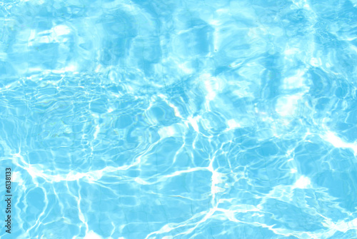 Abstract blue Water of a Swimming Pool .