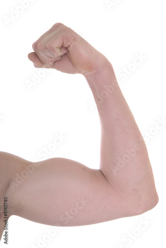 Young teenage male doing fitness exercises in the gym, 