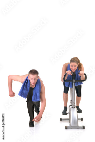 attractive female, handsome male doing fitness exercises  © Patrick Hermans