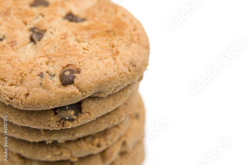 Stack of homemade chocolate chip cookies. Isolated on white.