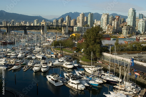 Boats in a marina False Creek  Burrard Bridge Vancouver © greenstockcreative