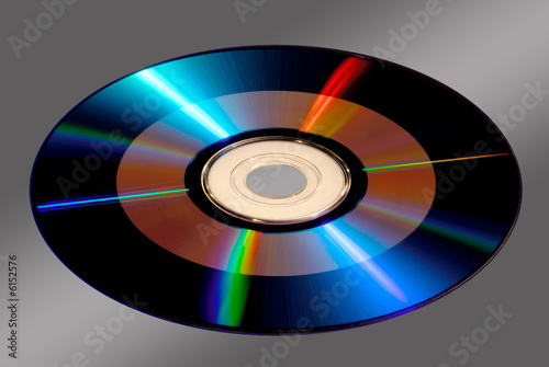 DVD / CD-ROM Disk Isolated on Gray with Clipping Path