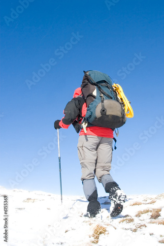 Tourists are in winter in mountains