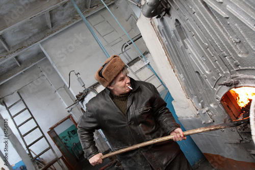 The stoker works in the boiler room