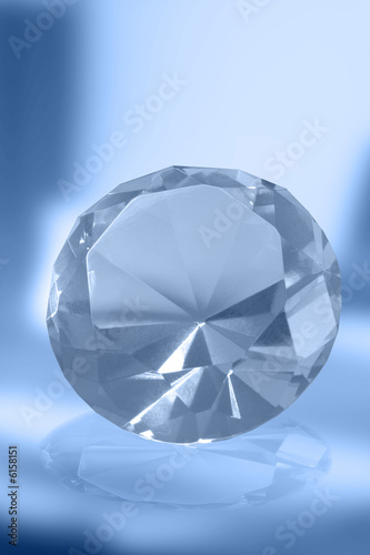  A big diamond with blue light reflections.