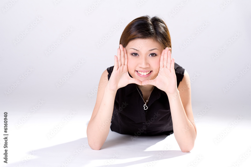 young woman smiling with her palms showing young woman smiling with her palms showing