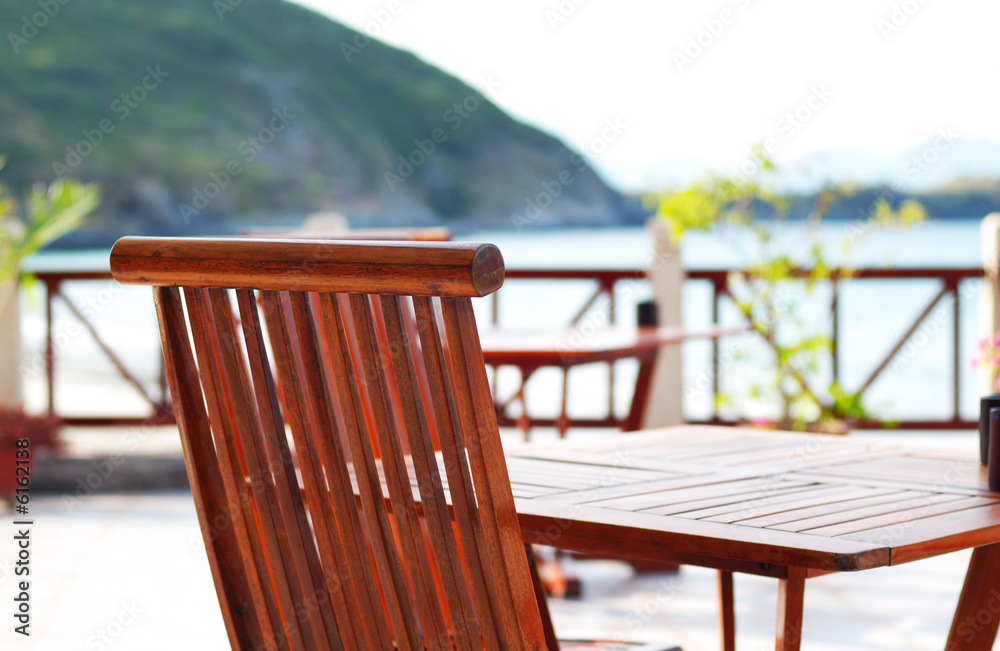 A patio and chairs in tropical resort