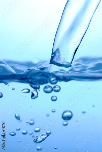 Fresh water pouring in a glass