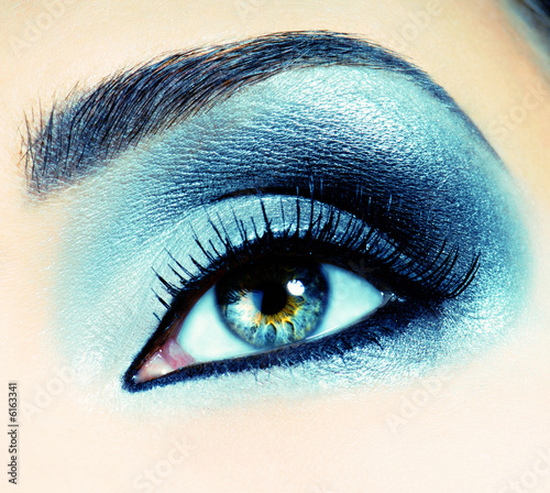 Fashion Image of woman eye with creative make-up photo