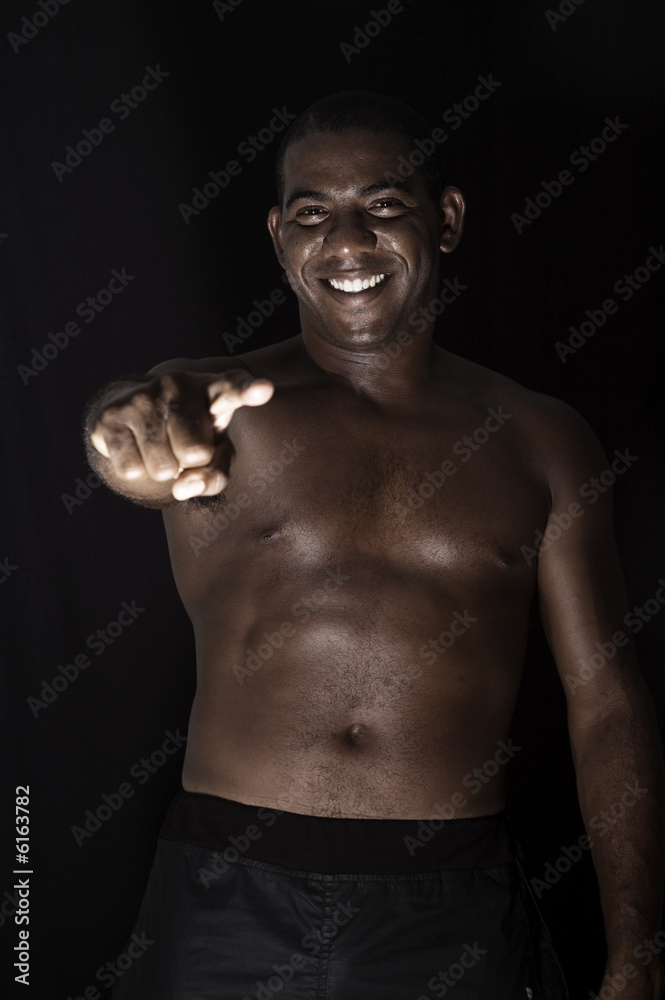 Fototapeta premium Portrait of young afromerican man with happy expression