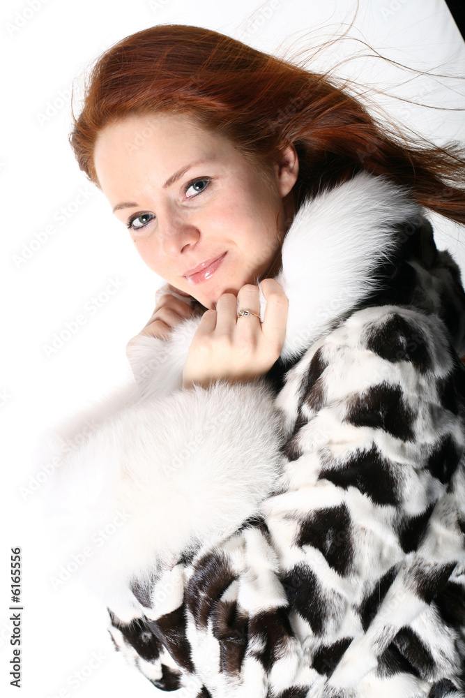 happy red hair girl in fur
