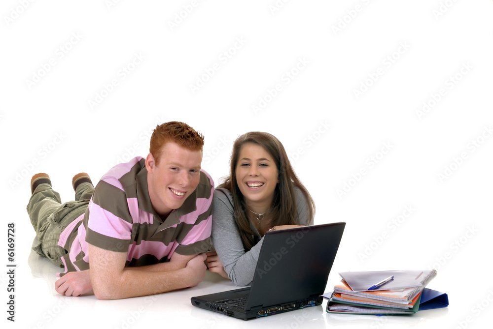 Teen students working on laptop