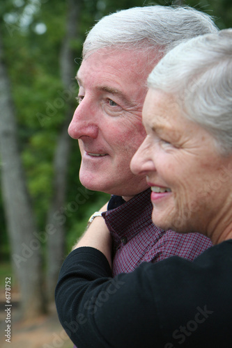 Happy Senior Couple smiling...