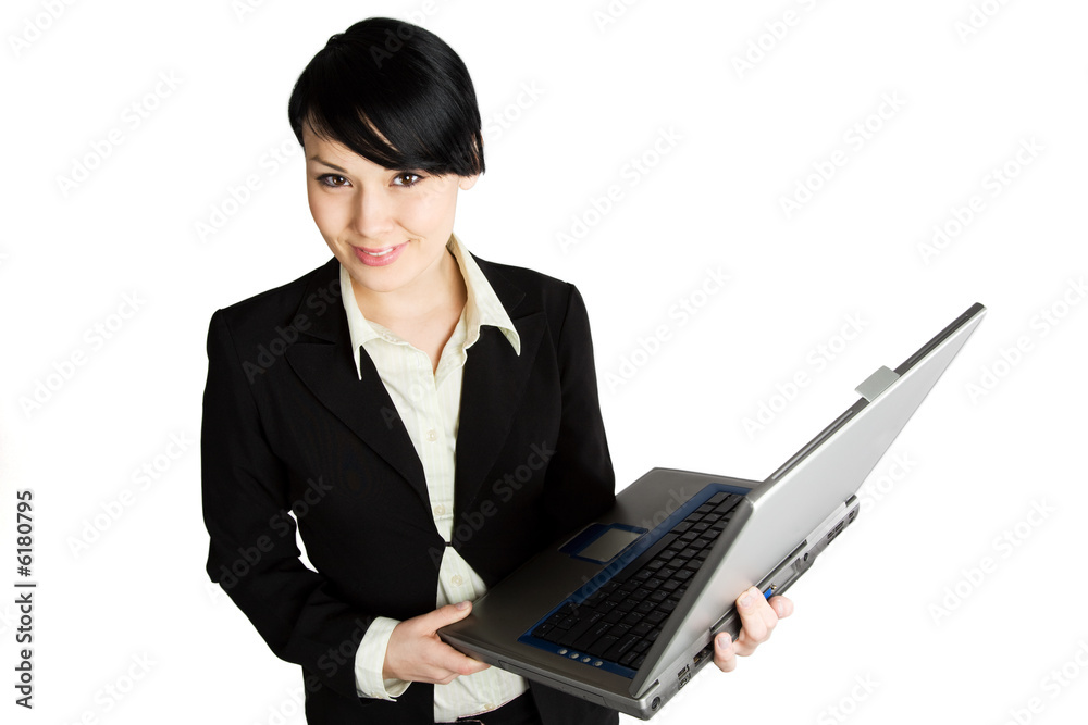 An isolated shot of a businesswoman with a laptop An isolated shot of a businesswoman with a laptop