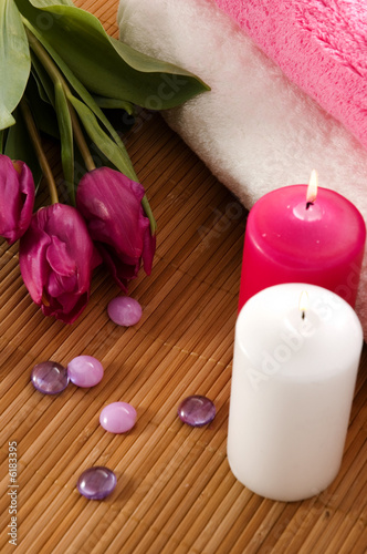 Towels, tulips and candles in a SPA composition.
