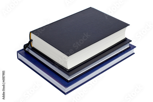 A pile of books isolated on white background. Path included