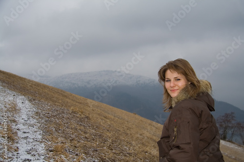 Young attractive woman trekking