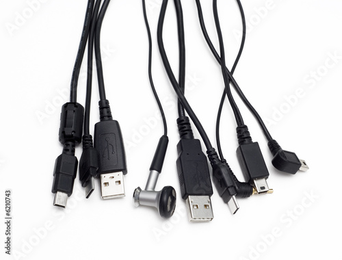 black cords and cables isolated over white background photo