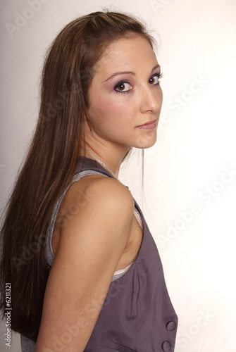 woman with brown long hair and body warmer