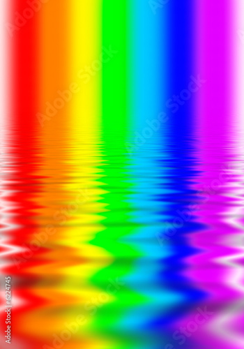 Beams of colors of a rainbow reflected on a water surface