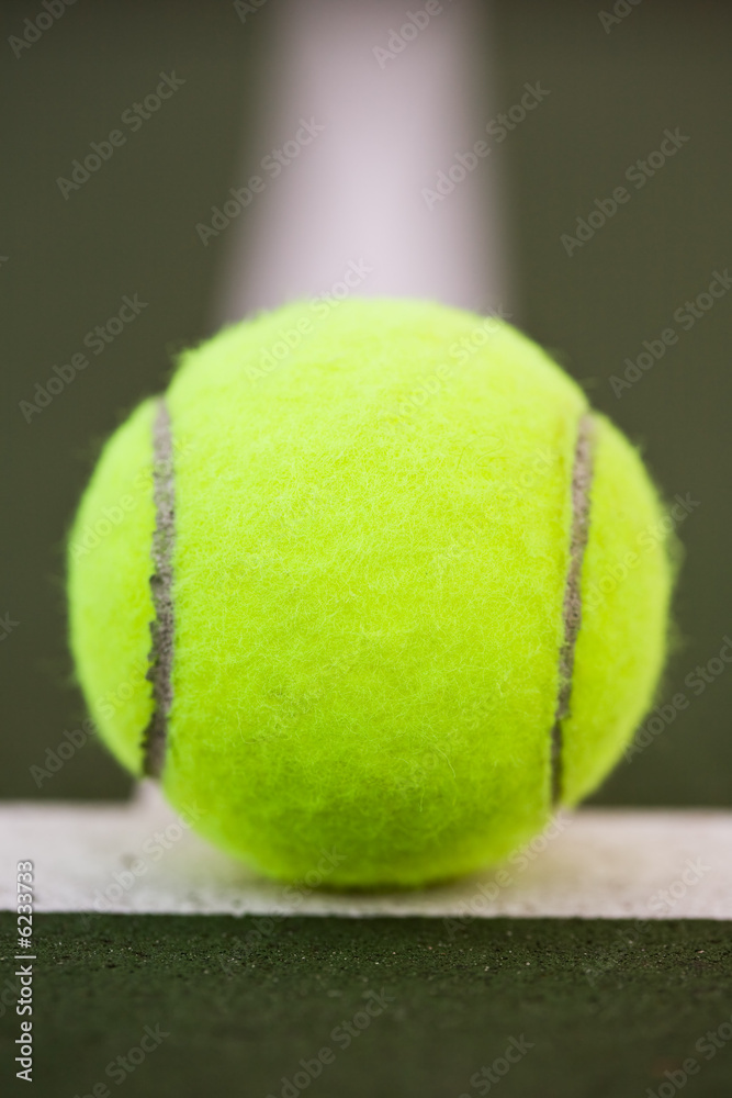 A shot of a tennis ball in the tennis court