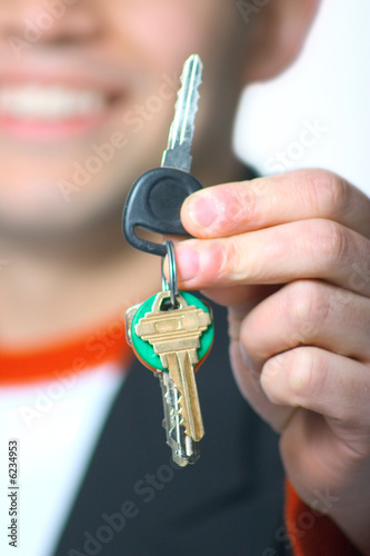 Man Giviing/Receiving Car Keys
