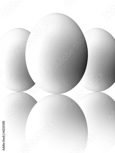 three eggs reflecting