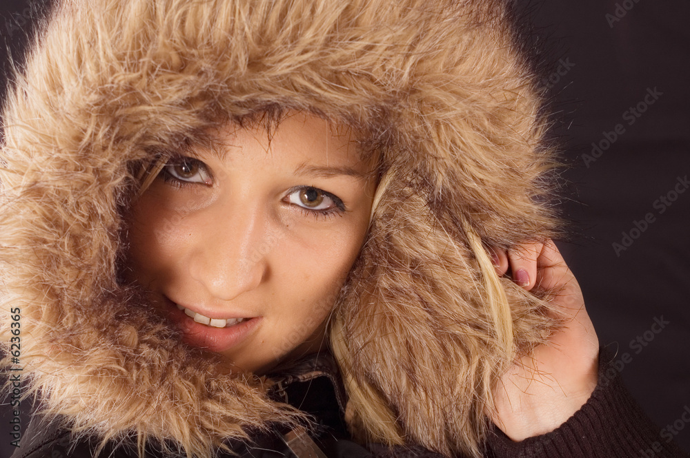 Portrait of fresh and beautiful woman with hood Portrait of fresh and beautiful woman with hood