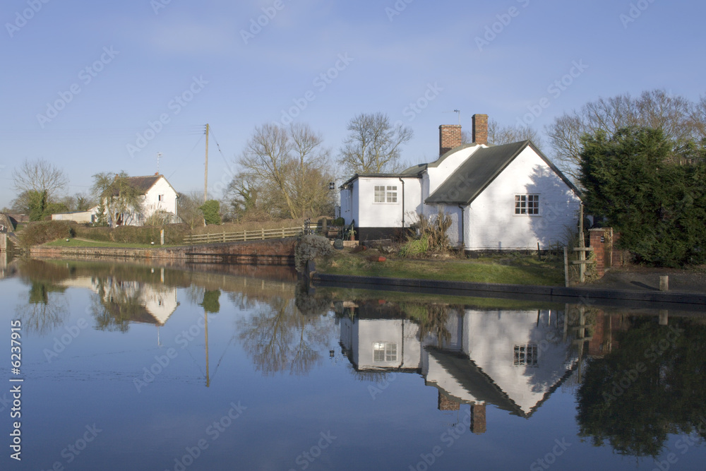 Houses next to lake or river or canal. Houses next to lake or river or canal.