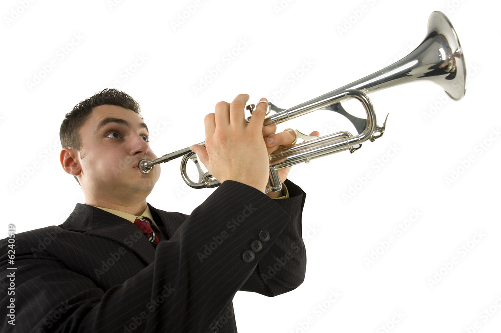 Obraz premium Man in suit standing and trumpet melody. Low angle view.