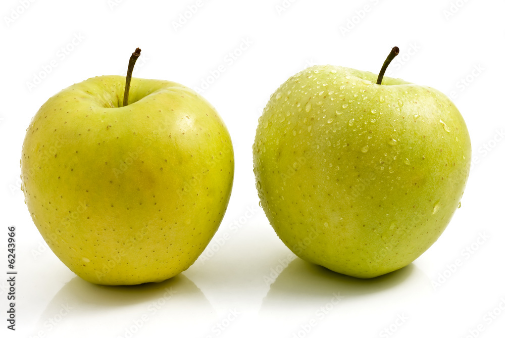 Two Wet Green Apples isolated over white Two Wet Green Apples isolated over white