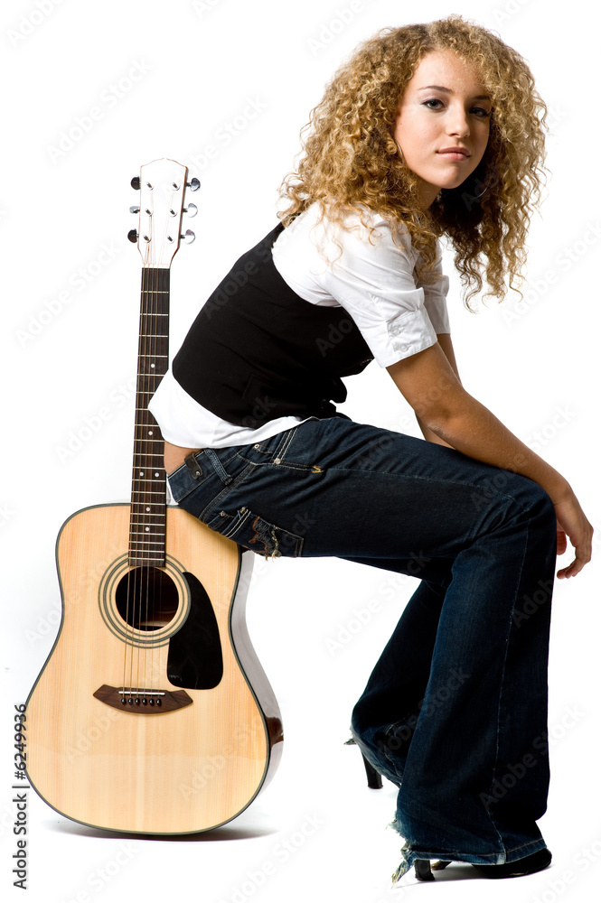 A pretty teenage girl with acoustic guiatr A pretty teenage girl with acoustic guiatr
