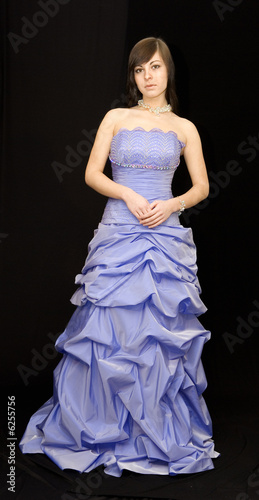 The young girl advertises a dress