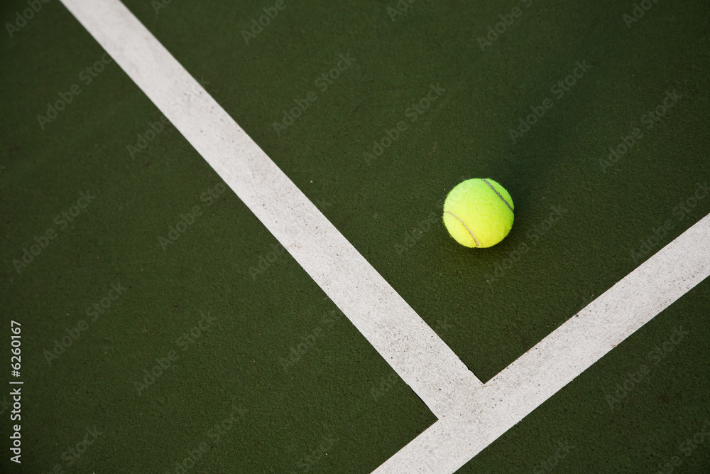 A shot of a tennis ball in the tennis court