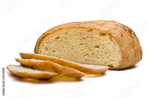 Sliced white bread and several slices (isolated on white)