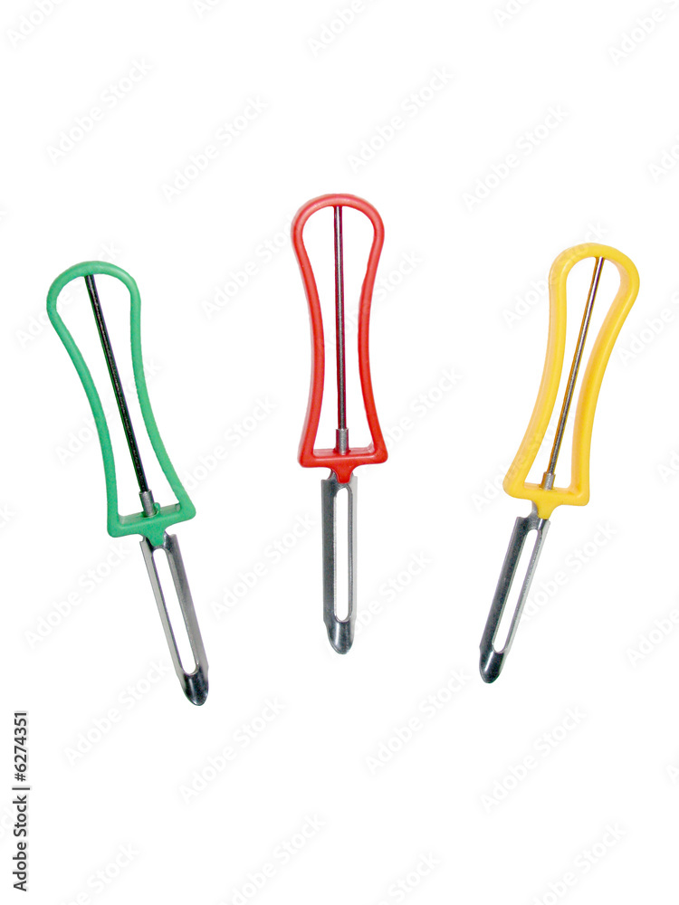 Isolated Carrot and Potato Peelers on a white background Isolated Carrot and Potato Peelers on a white background