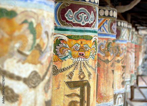 Buddhist rolling poles