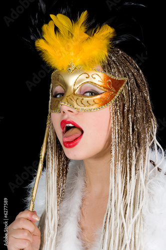 Portrait girl with mask on black background