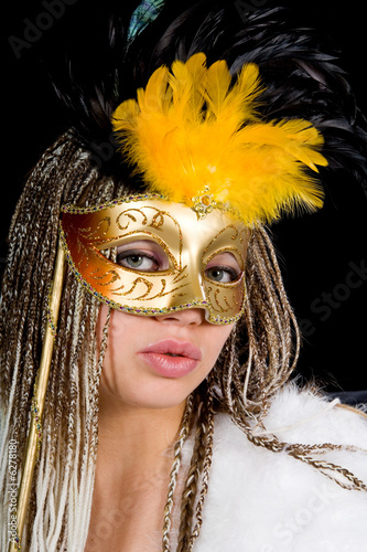 Portrait girl with mask on black background