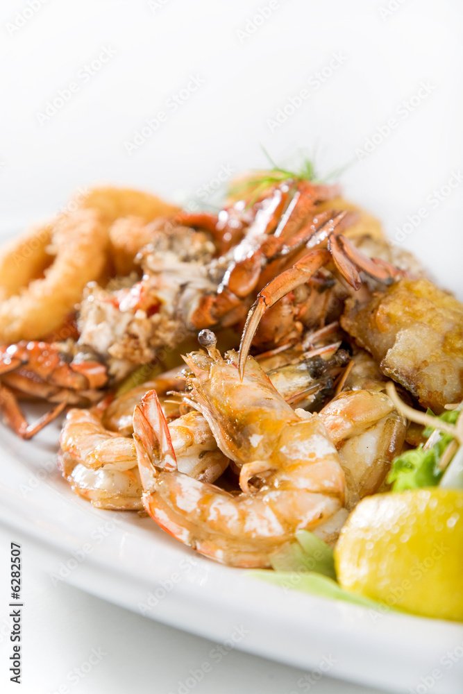 seafood main dish served with shrimps, crabs and calamari seafood main dish served with shrimps, crabs and calamari